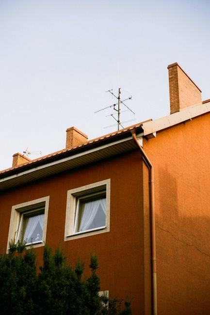 White uPVC fascia boards and guttering along the roofline of a house